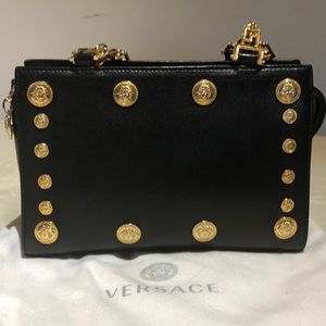 Women clutch gold shoulder strap  Versace bag $600